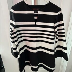 Nina McLemore bold black and white striped tunic.